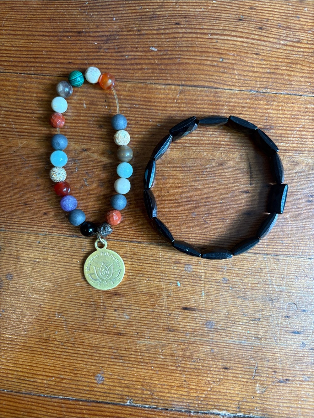 Beaded Chakra Bracelet with Gold Lotus Charm - Multicolor And Black Bracelet